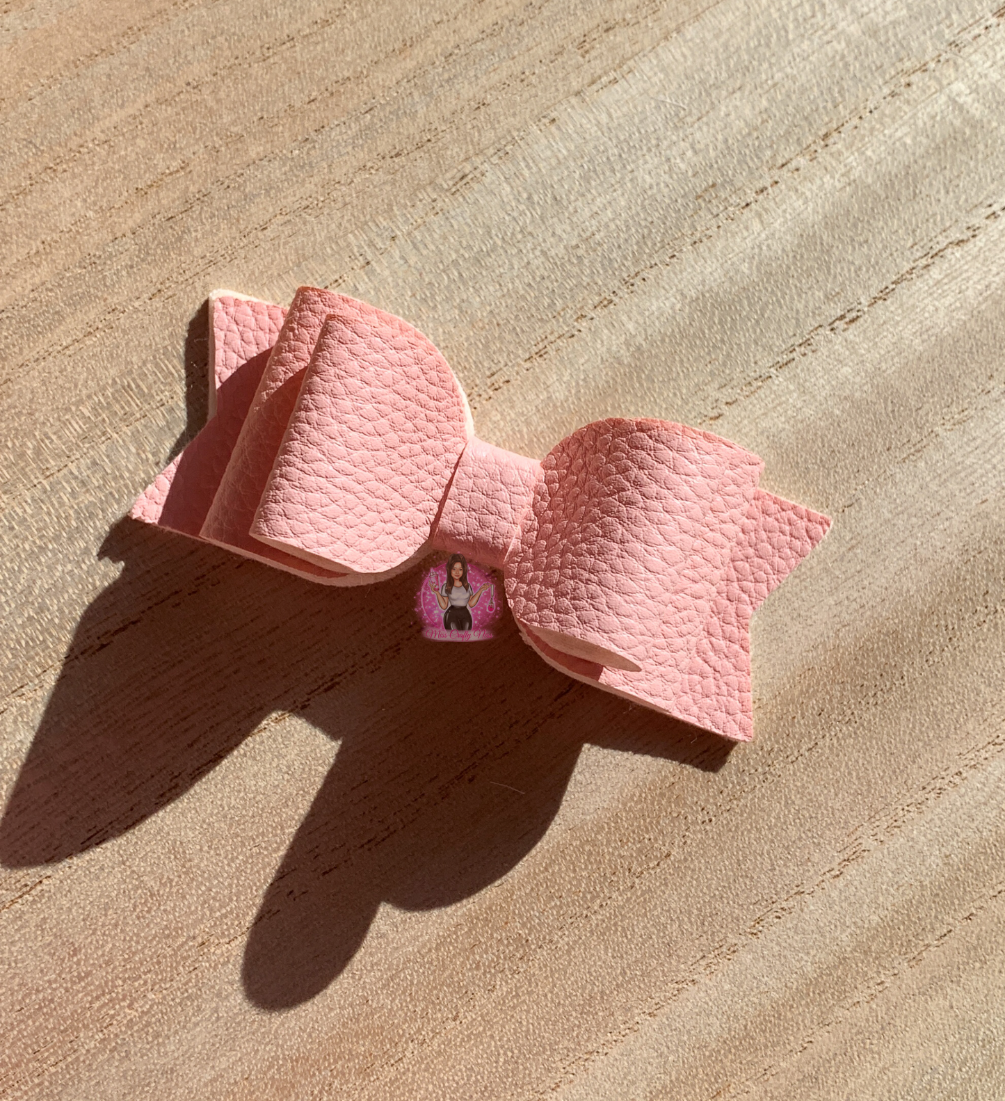 Blush bow straw topper