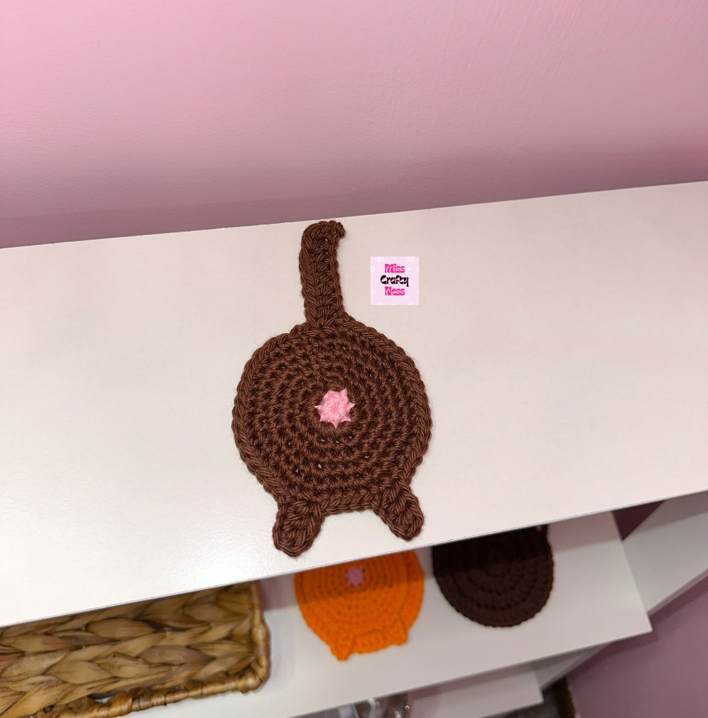 Crochet cat butt coaster