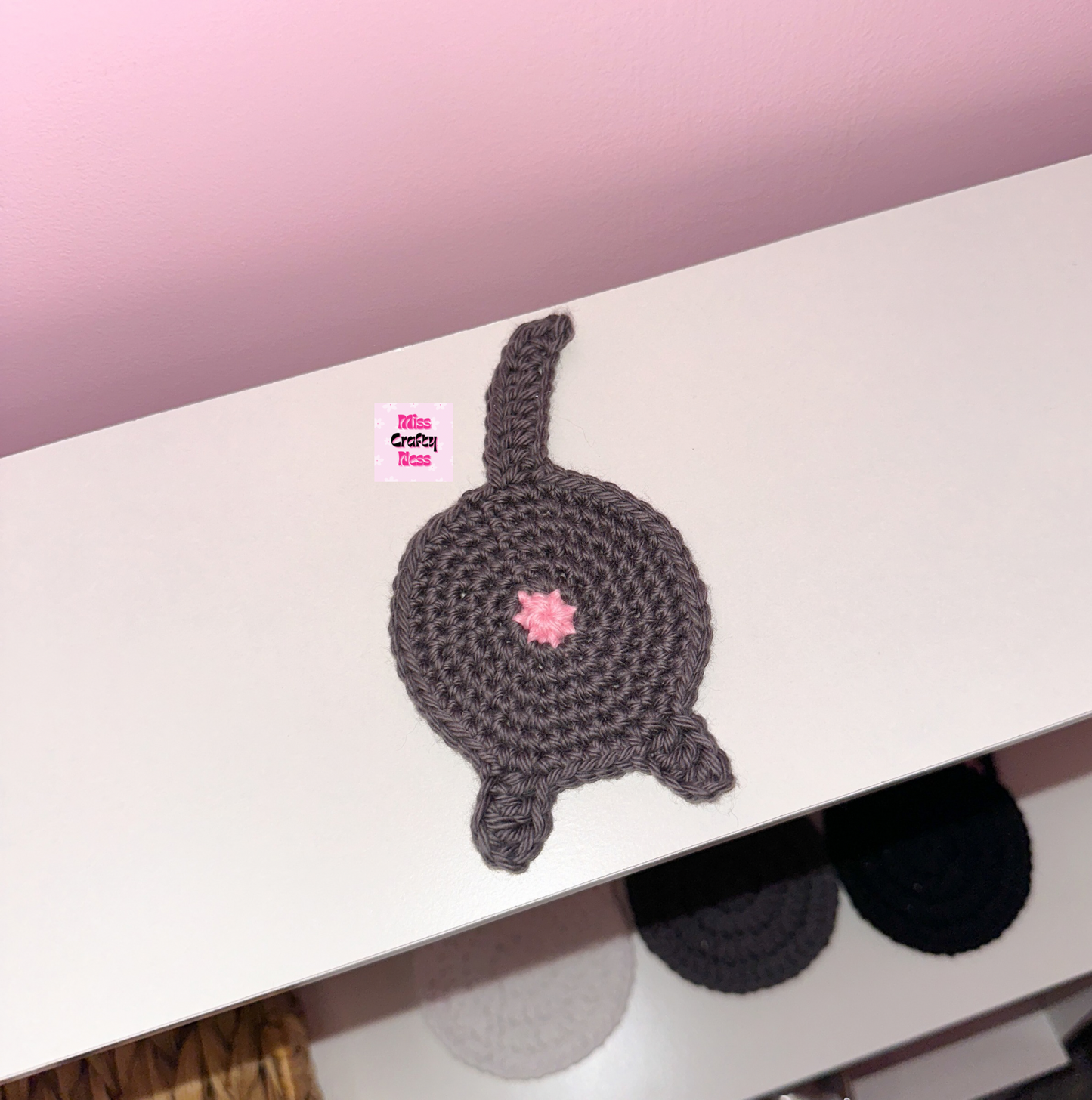 Crochet cat butt coaster