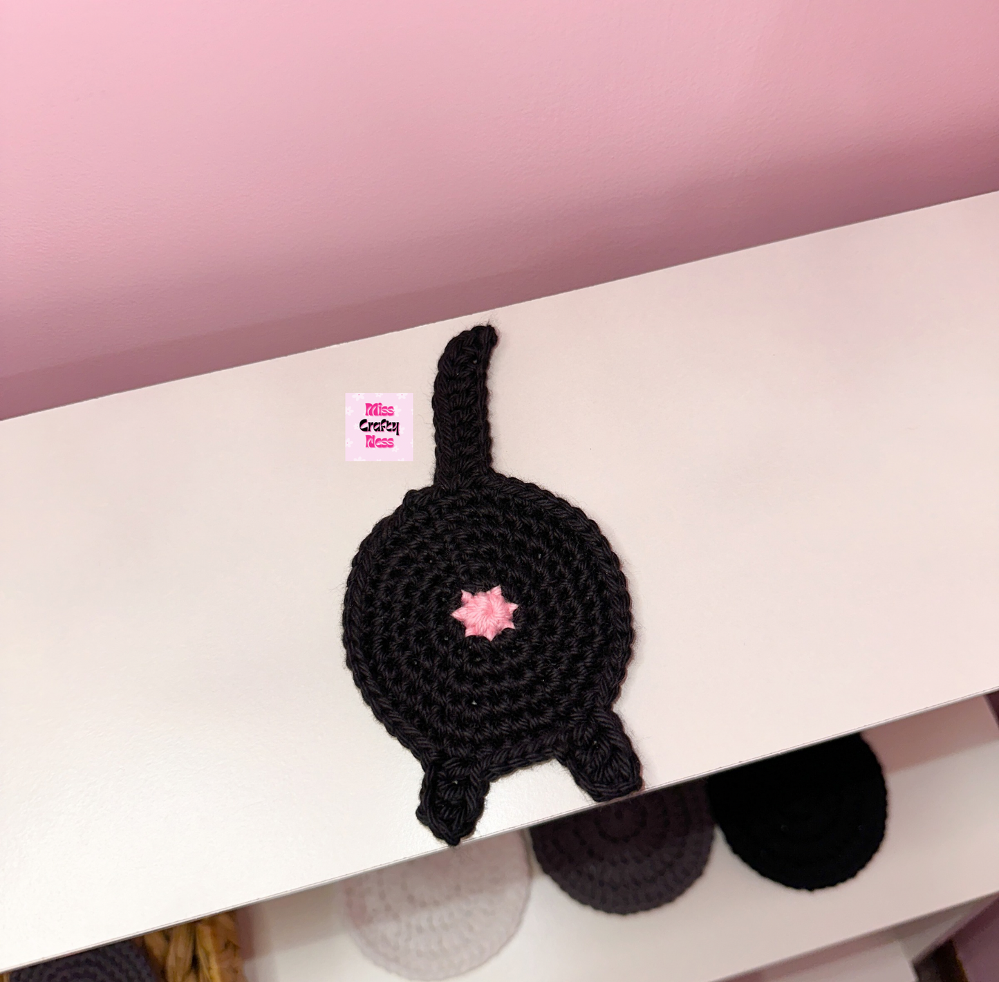 Crochet cat butt coaster