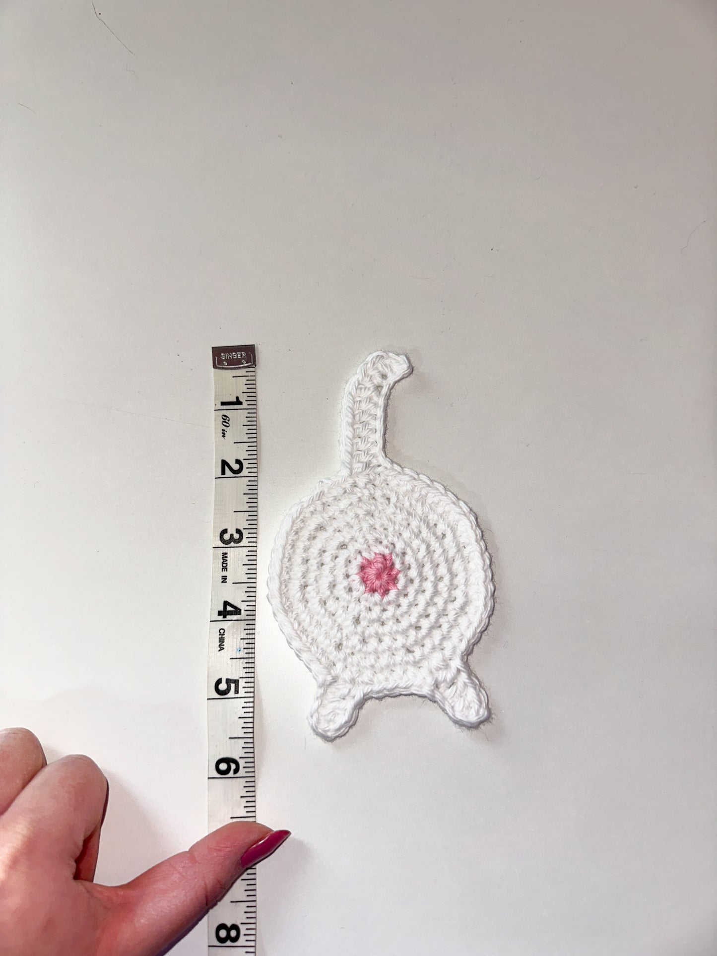 Crochet cat butt coaster