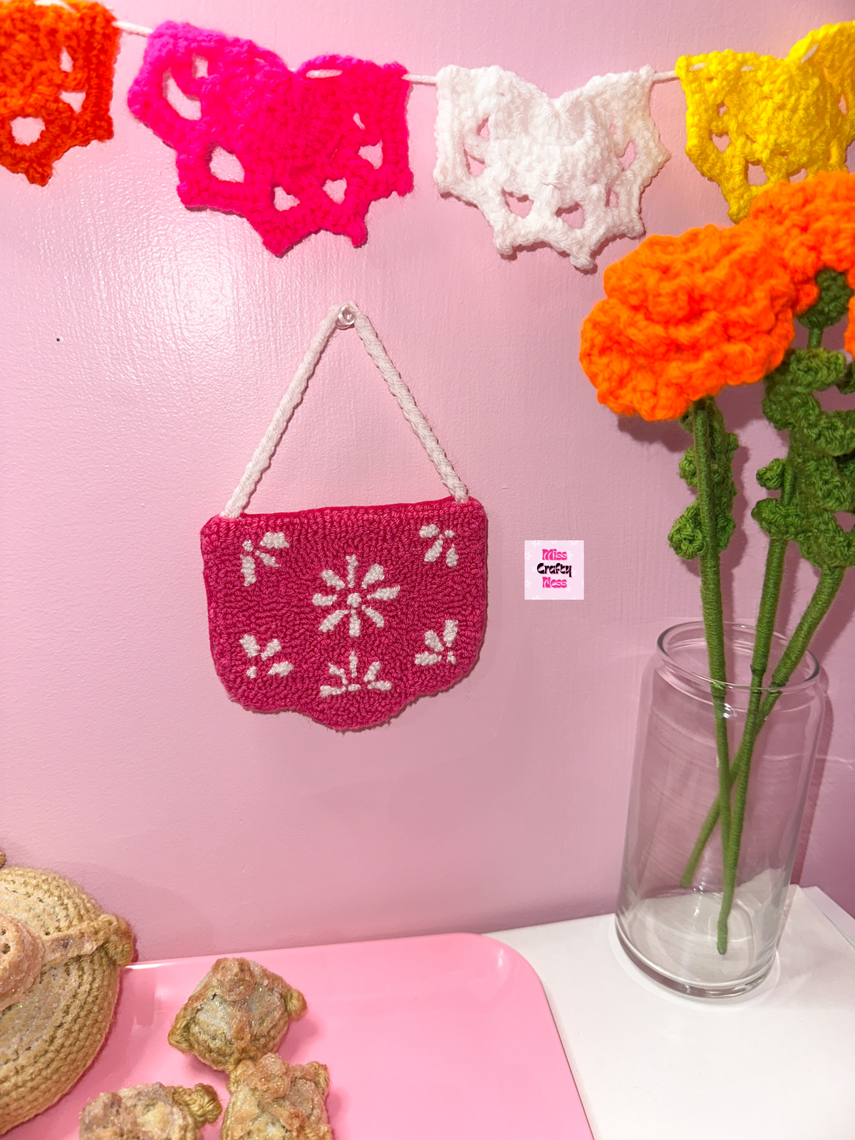 Papel picado punch needle wall hanging