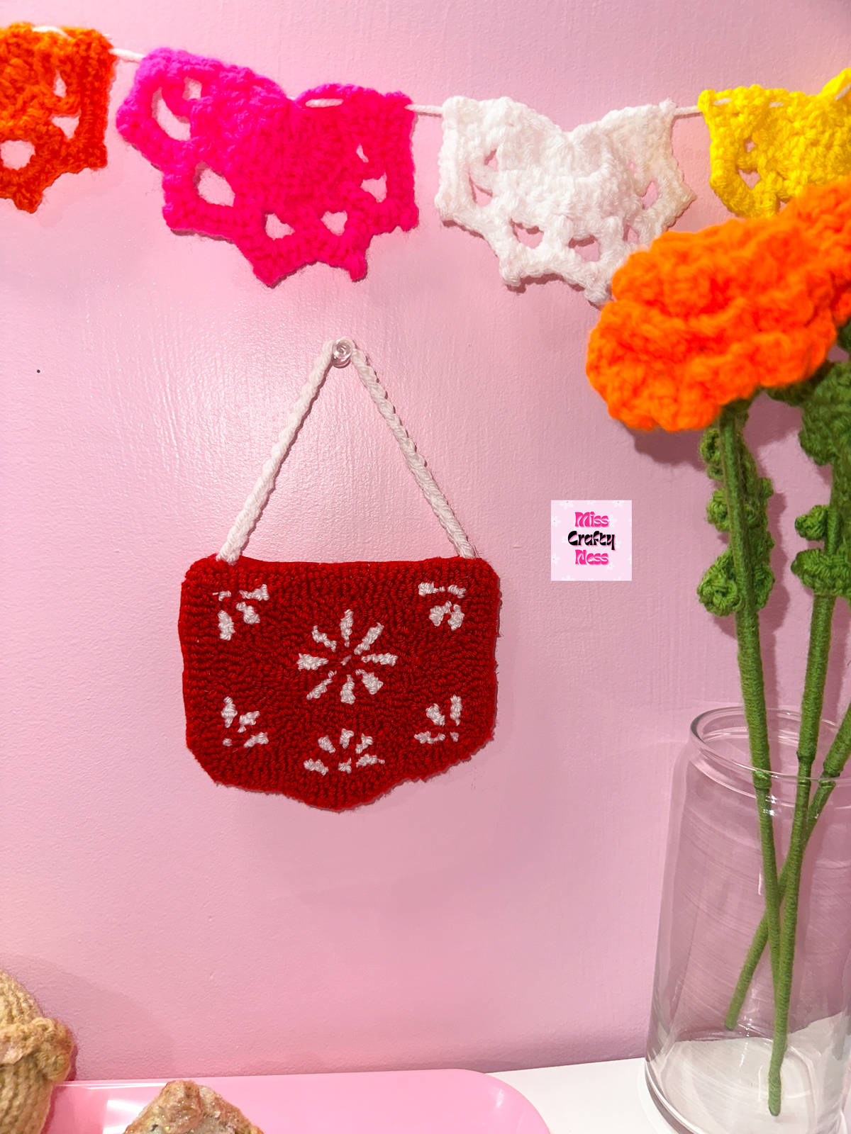Papel picado punch needle wall hanging